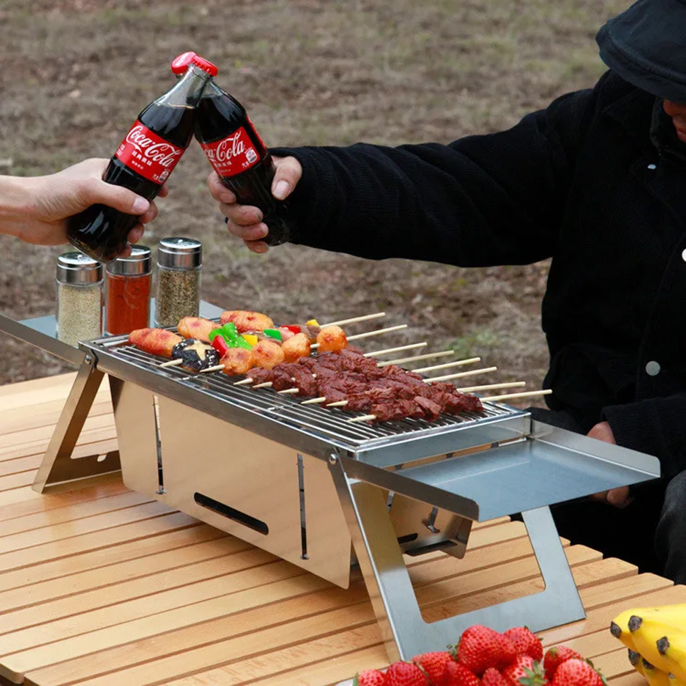 Portable Stainless Steel Folding Barbecue Grill with Adjustable Height Settings and Smokeless Cooking Experience - Easy to Assemble and Clean for Indoor and Outdoor Use