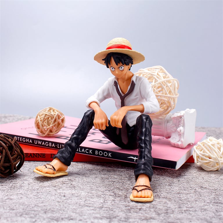 12cm One Piece Luffy Sitting Figure | Premium PVC Material | Collectible Statue for Fans & Collectors | Gift-Worthy Anime Toy | Dynamic Pose & Detailed Craftsmanship | Ideal for Display on Shelves & Desks | Compact & Portable Size