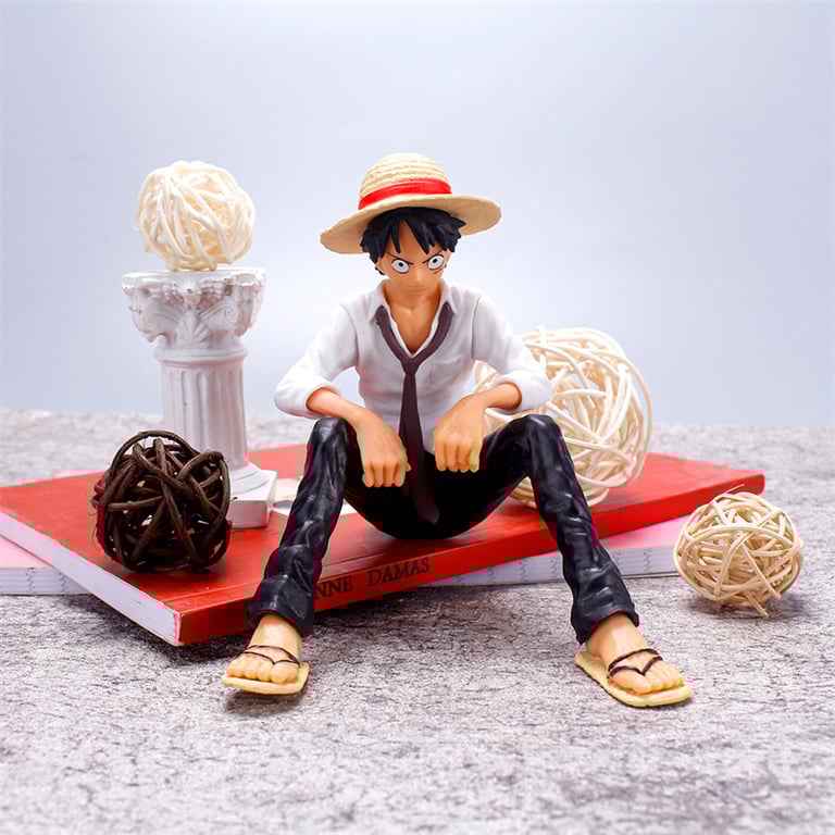 12cm One Piece Luffy Sitting Figure | Premium PVC Material | Collectible Statue for Fans & Collectors | Gift-Worthy Anime Toy | Dynamic Pose & Detailed Craftsmanship | Ideal for Display on Shelves & Desks | Compact & Portable Size