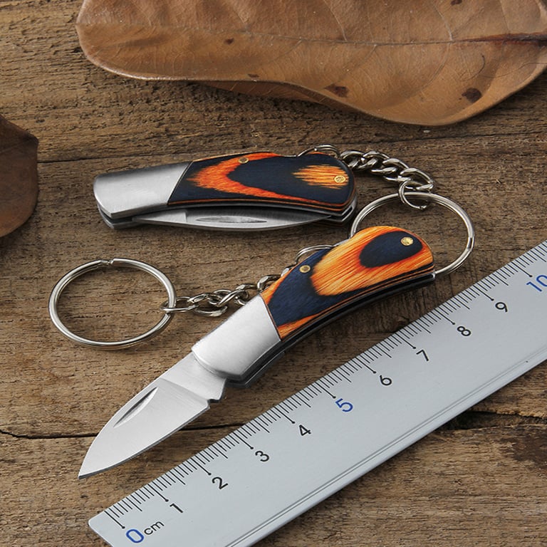 Stainless Steel Compact Keychain Folding Pocket Knife with Pendant - Lightweight and Durable Multi-functional Camping Tool - Portable and Stylish Gift Idea for Outdoor Enthusiasts
