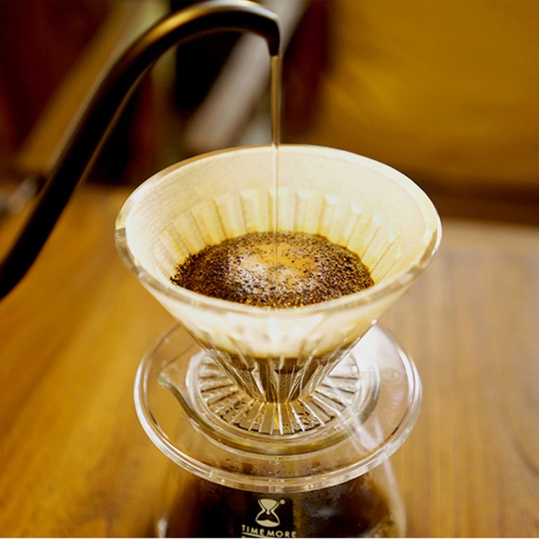 TIMEMORE Store Coffee Pot Filter Paper - Pack of 50 Premium V-Shaped Filters for Hand Drip Cups and American Coffee Machines - Enhanced Flavor Extraction - High-Quality Materials - Easy to Use and Dispose - Versatile Compatibility for Pour-Over and Drip Brewing Methods